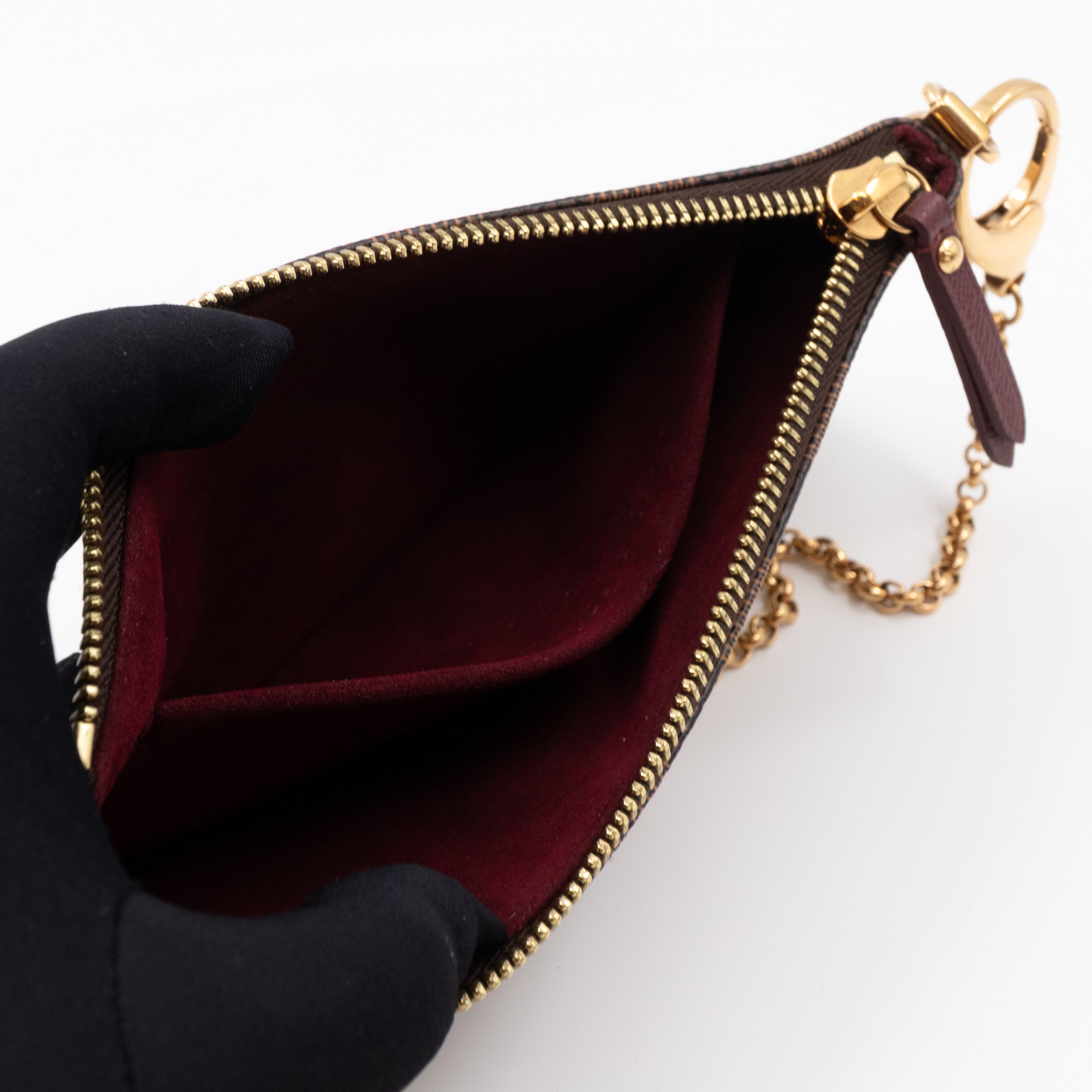 Milla MM Pochette Damier Ebene Trunk