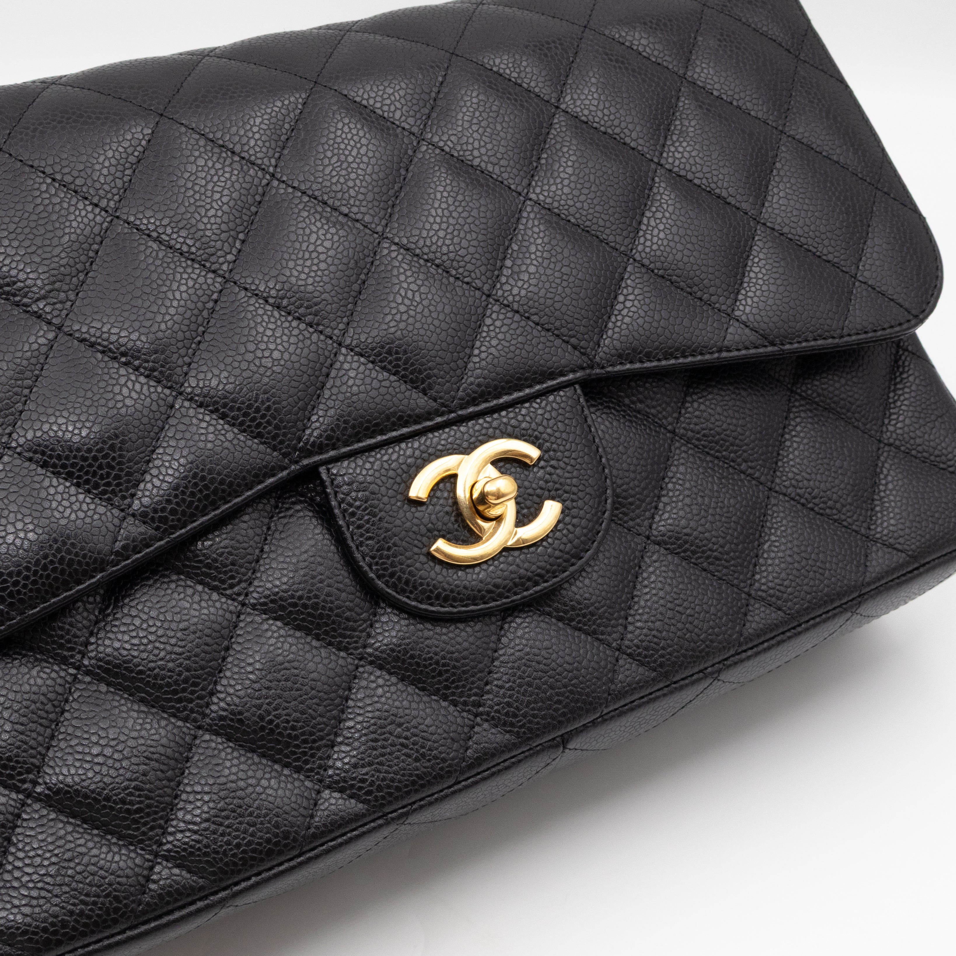 Classic Double Flap Jumbo Black Caviarskin Leather Gold