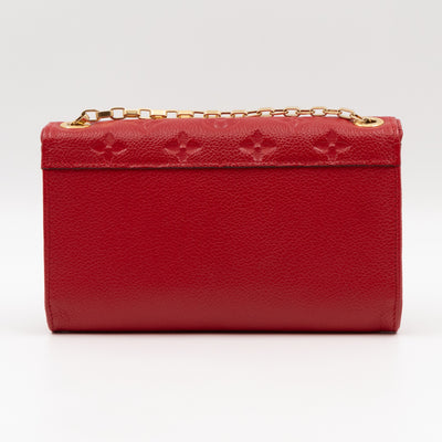 Saint Germain Pochette with chain Red Monogram Empreinte