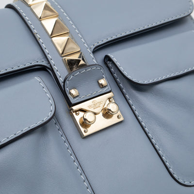 Large Rockstud Glam Lock Top Handle Bag Blue Leather