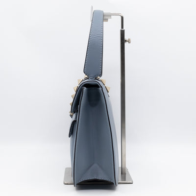 Large Rockstud Glam Lock Top Handle Bag Blue Leather