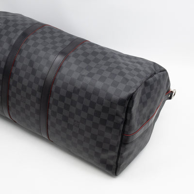 Keepall 55 Bandouliere Damier Graphite Rouge