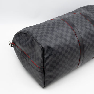 Keepall 55 Bandouliere Damier Graphite Rouge