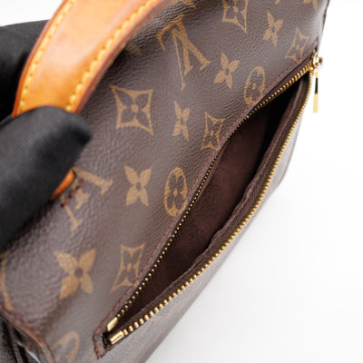 Pochette Metis Monogram