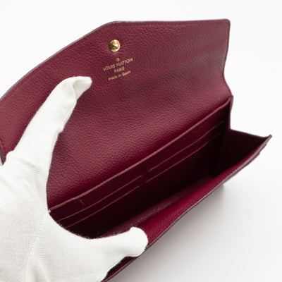 Curieuse Wallet Monogram Empreinte Aurora